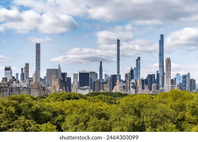 New York City Billionaire's Row supertall skyscrapers with Central Park trees in spring (elevated view). Midtown Manhattan - Powered by Shutterstock