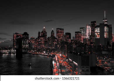 New York City black and white night skyline with red lights glowing in downtown Manhattan NYC