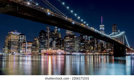 New York City By Night With The Brooklyn Bridge