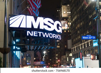 New York City, Circa 2017: Madison Square Garden MSG Television Networks Business Offices And Studio Building Neon Light Sign Above Sidewalk Outside Famous Stadium Arena Lit Up At Night