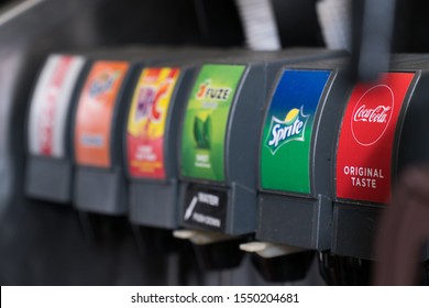 New York City, Circa 2019: Coca Cola Drink Brand Soda Fountain Dispenser With Variety Of Carbonated Beverage Taps Mix Water With Syrup And Fizz