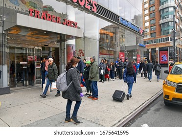 NEW YORK CITY CIRCA MARCH 2020. As The Coronavirus Pandemic Broadens In Scope, Grocery Stores Such As Trader Joe’s Are Seeing Long Lines Of People Stocking Up On Food And Provisions