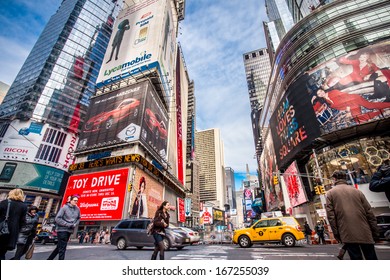 NEW YORK CITY - DEC 13:  Street View Of Broadway At Times Square In New York City On Dec 13, 2013. Times Square Is A Busy Entertainment District Well Known For Its Annual New Years Eve Celebration.