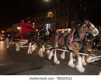 NEW YORK CITY - DECEMBER 06 2017: Budweiser's legendary Clydesdales delivered cases of beer to two of Brooklyn's most prodigious consumers of their famous brand.