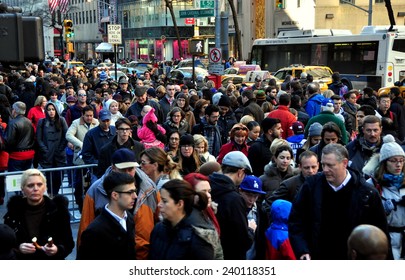 New York City - December 26, 2014:  Throngs Of People Walking Along Fifth Avenue At 50th Street The Day After Christmas