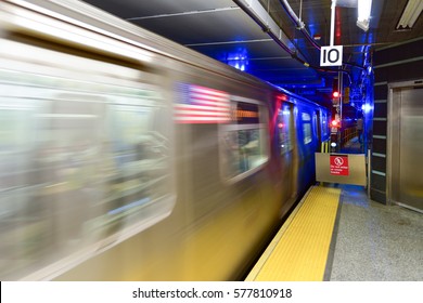 New York City - February 11, 2017: Q train passing through the 72nd Street subway station on Second Avenue in New York City, New York.