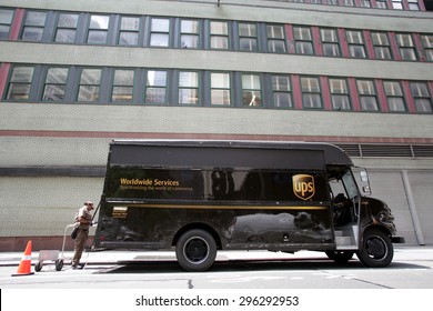 NEW YORK CITY - FRIDAY, JUNE 19, 2015: An United Parcel Service (UPS) Delivery Truck And A Driver In Manhattan.