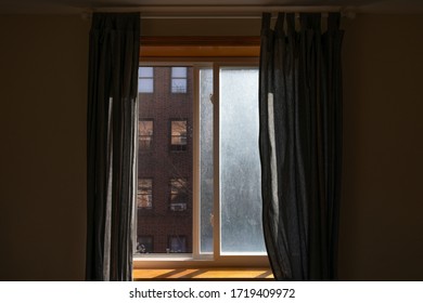 New York City Interior Apartment Window On A Sunny Day With Curtains