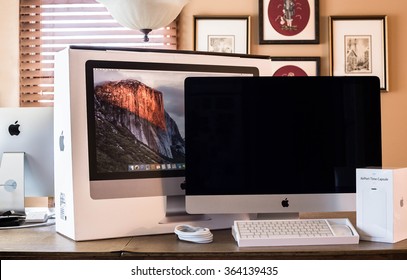 NEW YORK CITY - JANUARY 12, 2016:  New Apple IMac Home Computer With Box And AirPort Time Capsule In Home Setting. 