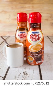 NEW YORK CITY - JANUARY 22, 2016:  Two Bottle Of Coffee-mate Liquid Flavored Coffee Creamer And A Mug Of Coffee.  