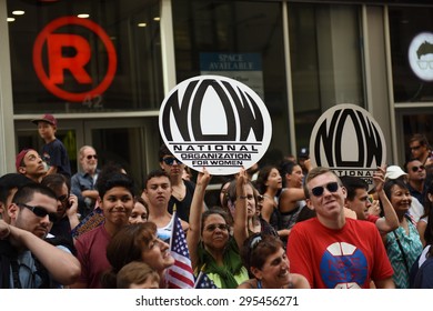 NEW YORK CITY - JULY 11 2015: A Ticker Tape Parade Was Held For The Champion US Women's FIFA Team Along Canyon Of Heroes On Broadway. National Organization For Women Signs