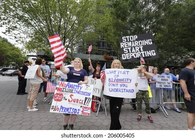 NEW YORK CITY - JULY 19 2014: Immigration Opponents Faced Off Against Immigrant Supporters To Protest Amnesty For Undocumented Immigrants In Front Of The United Nations.