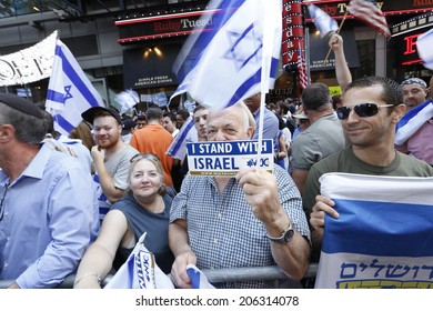 NEW YORK CITY - JULY 20 2014: Several Thousand Supporters Of Israeli Actions In Gaza Staged A Rally In Times Square. Displaying Flags & Bumper Stickers