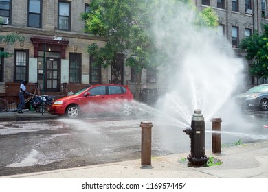 New York City - July 7, 2018: Water Beats From A Fire Hydrant During A Heat Wave In Brooklyn.