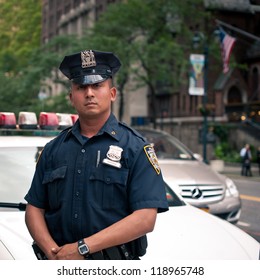 NEW YORK CITY - JUN 27: NYPD Police officer in NYC on June 27, 2012. The New York City Police Department (NYPD), established in 1845, is the largest municipal police force in the United States.