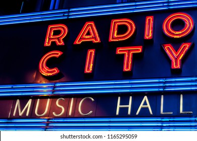 New York City, New York.  June 10, 2017.   The Iconic Radio City Music Hall Marquee Neon Lights Lit Up At Night In New York City.