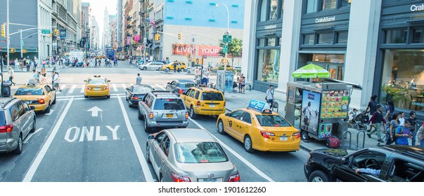 NEW YORK CITY - JUNE 11, 2013: Taxi Cabs Speed Up Along City Streets. In New York There Are More Than 13,000 Taxis.