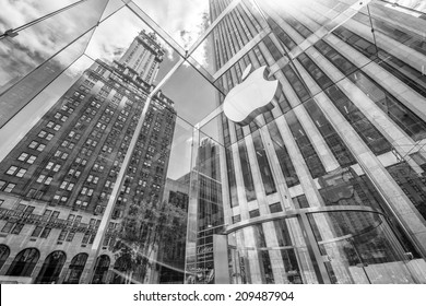 NEW YORK CITY - JUNE 12, 2013: Glass cube building of Apple Store on Fifth Avenue. The cube of glass entrance was designed by Bohlin Cywinski Jackson and has received numerous architectural awards