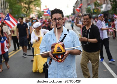 NEW YORK CITY - JUNE 14 2015: The First Sunset Park Puerto Rico Day Parade In Three Decades Was Held Along 5th Avenue In Brooklyn Late In The Evening To Permit Attendance At The Manhattan Parade