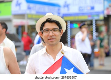 NEW YORK CITY - JUNE 14 2015: The First Sunset Park Puerto Rico Day Parade In Three Decades Was Held Along 5th Avenue In Brooklyn Late In The Evening To Permit Attendance At The Manhattan Parade