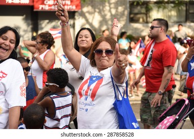 NEW YORK CITY - JUNE 14 2015: The First Sunset Park Puerto Rico Day Parade In Three Decades Was Held Along 5th Avenue In Brooklyn Late In The Evening To Permit Attendance At The Manhattan Parade