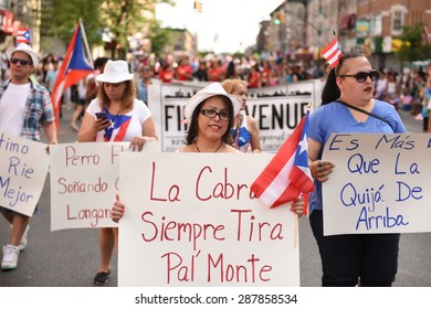 NEW YORK CITY - JUNE 14 2015: The First Sunset Park Puerto Rico Day Parade In Three Decades Was Held Along 5th Avenue In Brooklyn Late In The Evening To Permit Attendance At The Manhattan Parade