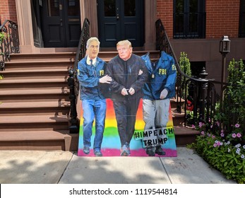 New York City, June 24, 2018 - Cardboard Cutout Of Robert Mueller Arresting President Trump On Display In The West Village In Manhattan.