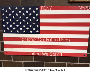 NEW YORK CITY - JUNE 4, 2018: 9/11 September 11 Sign From NYPD FDNY To Honor Fallen Heroes First Responders United We Stand.