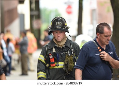 NEW YORK CITY - JUNE 6 2015: several FDNY ladder & engine companies responded to a residential fire in the Sunset Park neighborhood of Brooklyn. No serious injuries were reported