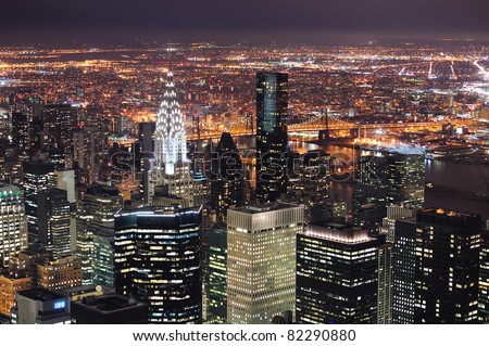 New York City Manhattan aerial view at dusk with urban city skyline and skyscrapers buildings
