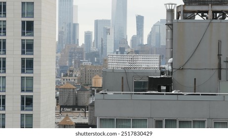 New York City Manhattan cityscape. Rooftop water towers, residential buildings roof tanks. Real Estate, urban architecture, United States streets. NYC Midtown Chelsea district, USA. World Trade Center - Powered by Shutterstock