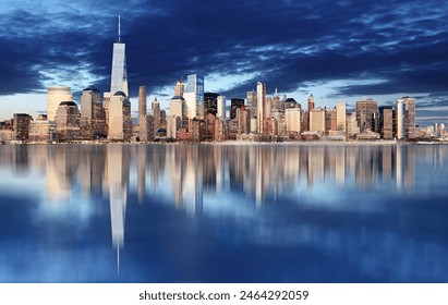 New York City Manhattan downtown skyline at night with skyscrapers lit over Hudson River  - Powered by Shutterstock