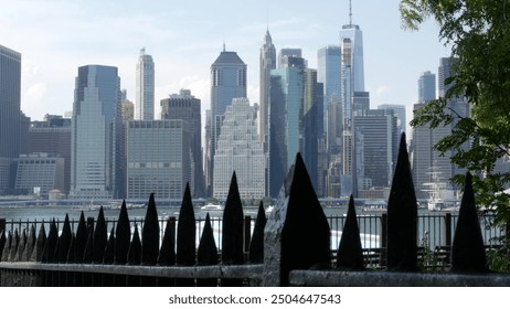 New York City Manhattan Downtown Financial District Skyline cityscape from Brooklyn Heights promenade, United States. Urban building architecture, FiDi World Trade Center high-rise skyscraper in USA. - Powered by Shutterstock