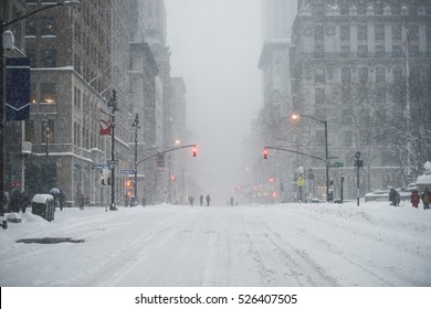 New York City Manhattan Midtown street under the snow during snow blizzard in winter. Empty 5th avenue with no traffic. - Shutterstock ID 526407505