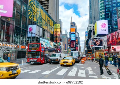 NEW YORK CITY, MANHATTAN, OCT,25, 2013: NYC Times Square Lights Screens Buildings Fashion Boutiques Architecture And Advertising Led Screens Street Traffic. Famous NYC Holidays Vacation Tours