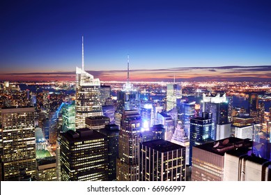 New York City Manhattan Skyline With Times Square Aerial View At Night.