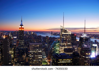 New York City Manhattan skyline aerial view with Empire State Building and Times Square at sunset. - Shutterstock ID 74350150