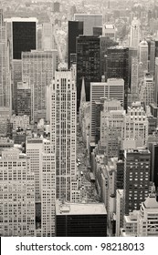 New York City Manhattan Street Aerial View Black And White With Skyscrapers, Pedestrian And Busy Traffic.