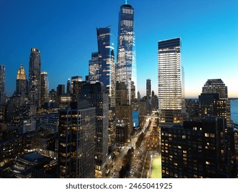 New York City Manhattan at sunrise. Manhattan at Night. NYC Night aerial view of Midtown Manhattan. Manhattan skyline with WTC. Famous landmarks, Skyscrapers skyline. Night traffic in big city. - Powered by Shutterstock