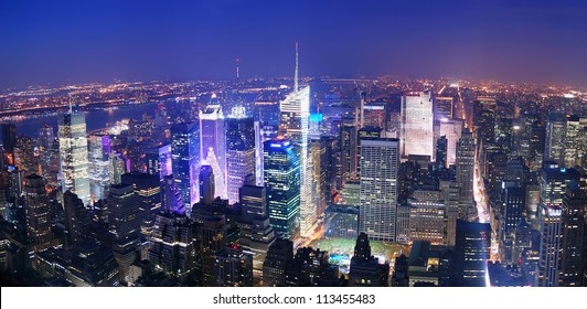 New York City Manhattan Times Square Skyline Aerial View Panorama At Night With Skyscrapers And Street.