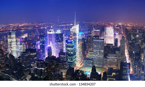 New York City Manhattan Times Square Skyline Aerial View Panorama At Night With Skyscrapers And Street.