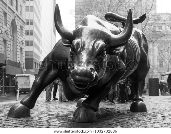 New York City - Mar 26: The landmark Charging Bull in Lower Manhattan represents aggressive financial optimism and prosperity March 26, 2015 in New York, NY, United States of America.