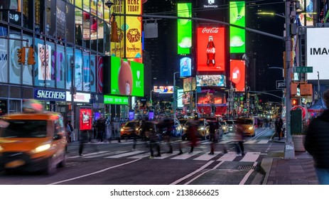 NEW YORK CITY -MARCH 13, 2022: Night view of the Times Square at night on March 13, 2022 in Manhattan, NY, USA. Times Square is the most visited tourist attraction in the world.