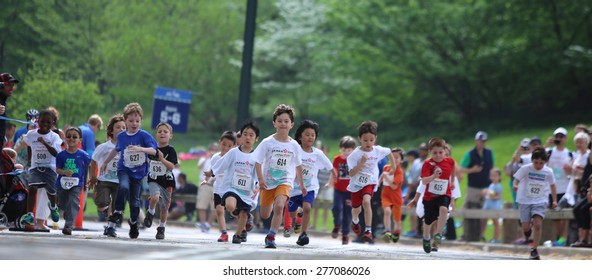 NEW YORK CITY - MAY 10 2015: New York Road Runners Sponsored A Kids' Run In Central Park To Mark The 9th Annual Japan Day. Kids 2 - 12 Participated In Groups Staggered By Age & Sex