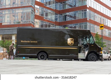 NEW YORK CITY - MAY 12, 2015: UPS van parked in a street of New York City. UPS is one of largest package delivery companies worldwide.
