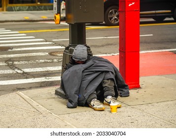 NEW YORK CITY - MAY 2, 2021: Homeless man at 34th Street in Midtown Manhattan 