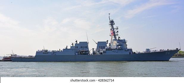 NEW YORK CITY - MAY 25 2016: Ships Of The US Navy Docked In The Brooklyn Ferry Terminal As The 28th Annual Fleet Week Started. USS Bainbridge Sails Into The East River