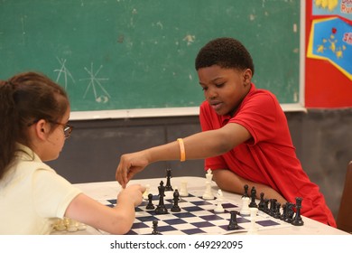 NEW YORK CITY - MAY 26 2017: Brooklyn Police Athletic League &  King's County DA's Office Sponsored An Afterschool Chess Program For Bed-Stuy Elementary Students.