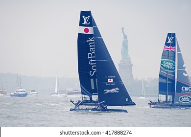 NEW YORK CITY - MAY 7 2016: The 35th Annual America's Cup Yacht Race Was Held In New York Harbor As Six Contenders Vied In Uneven Weather. Competing With Statue Of Liberty In The Background