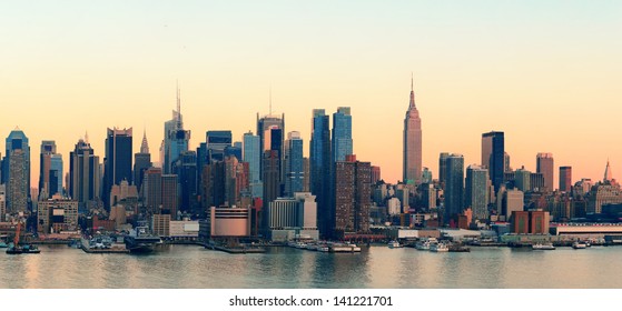 New York City midtown Manhattan sunset skyline panorama view over Hudson River - Shutterstock ID 141221701